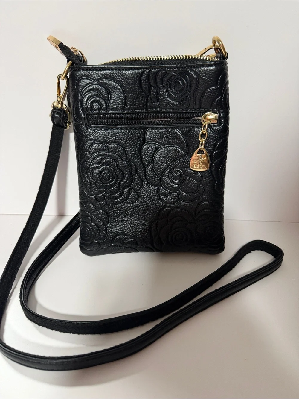 Black Embossed Floral Crossbody Bag with Gold Charm